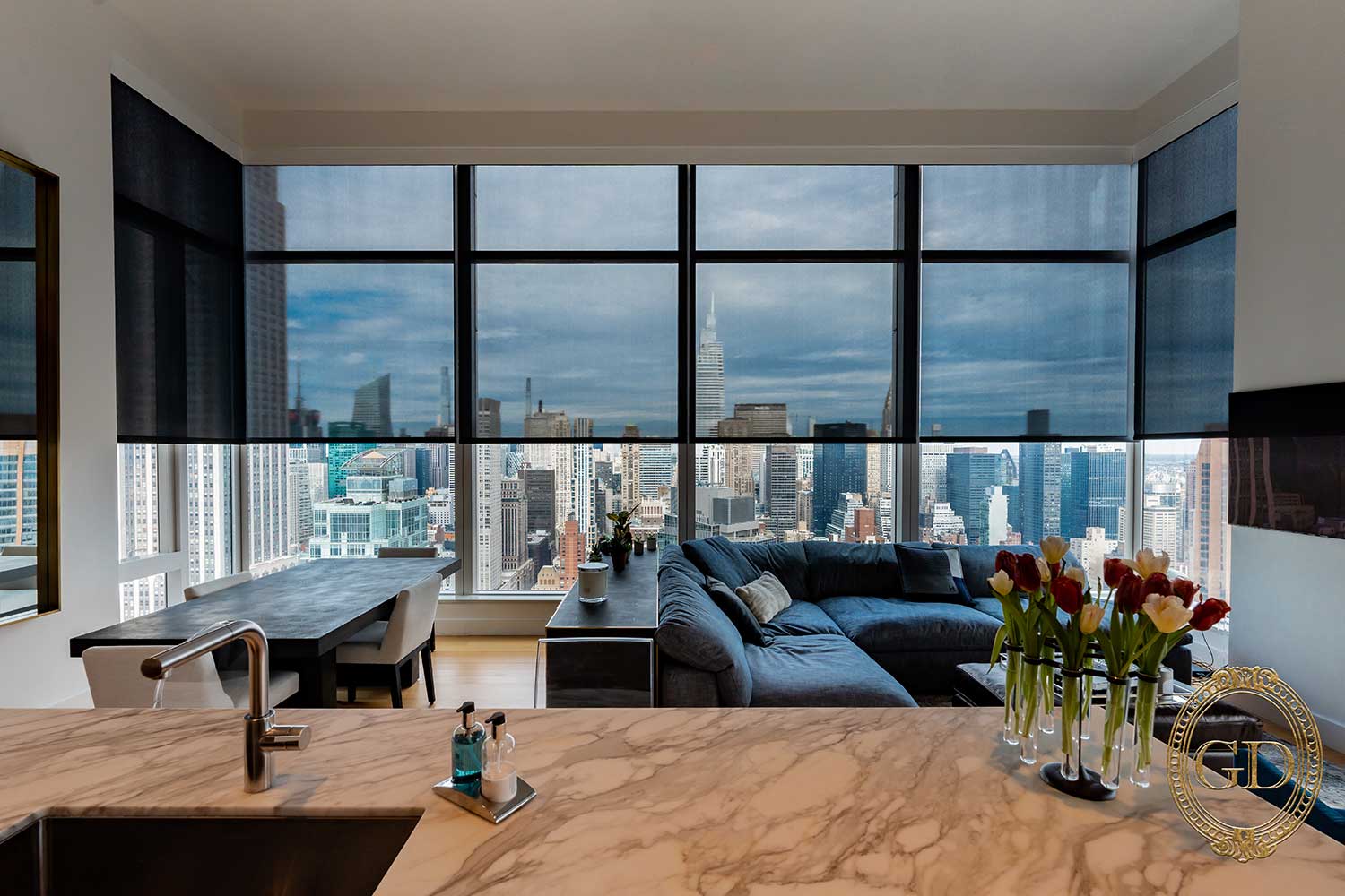 Modern motorized shades on expansive windows